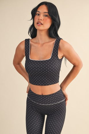 black polka dot sports bra